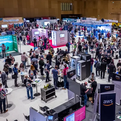 Busy exhibition hall seen from above